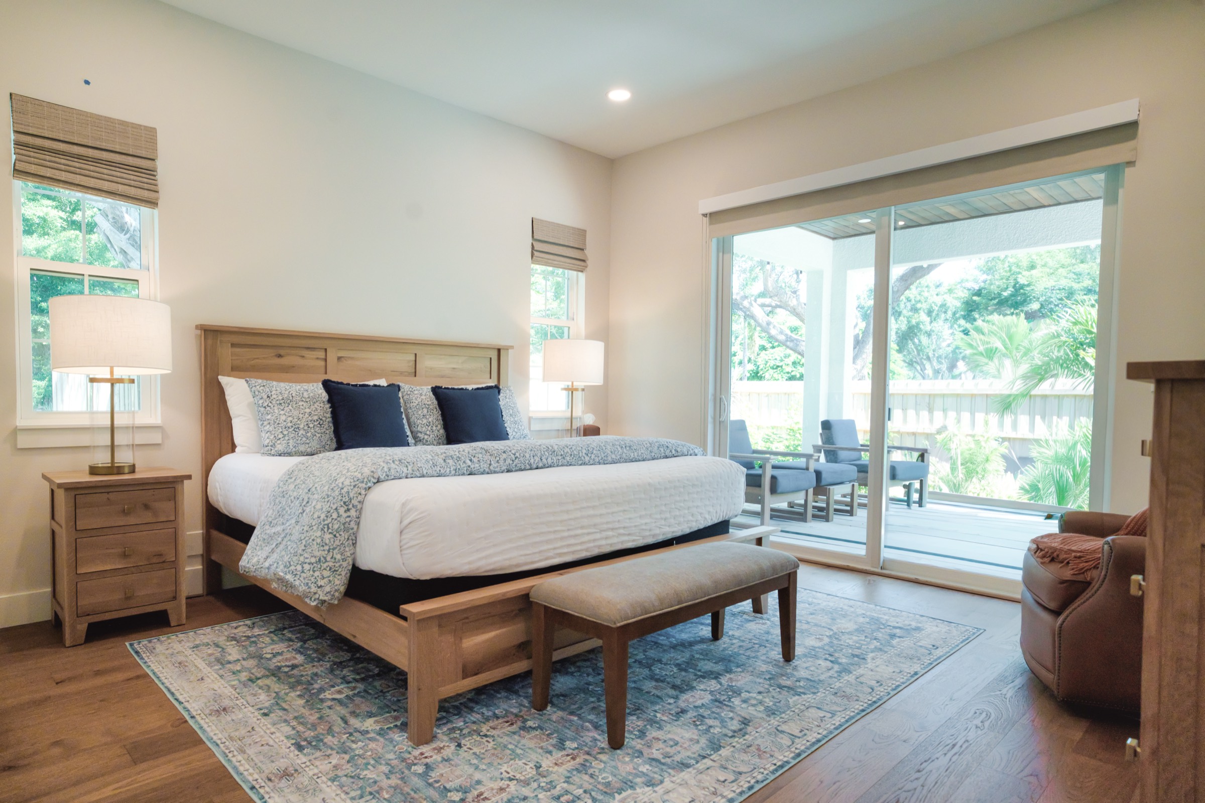 Bedroom made up with fresh linens by Refined Spaces